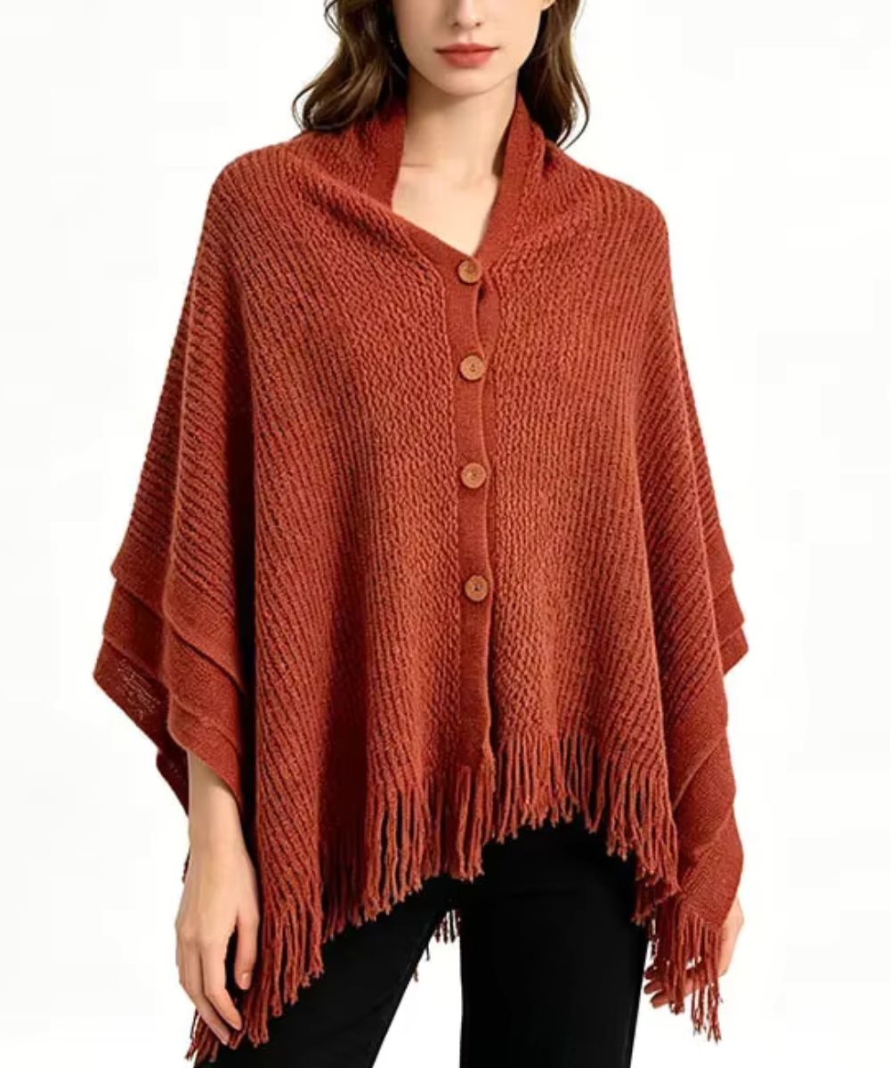 Poncho en tricot à maille couleur rouille avec boutons et franges de Planète Poncho