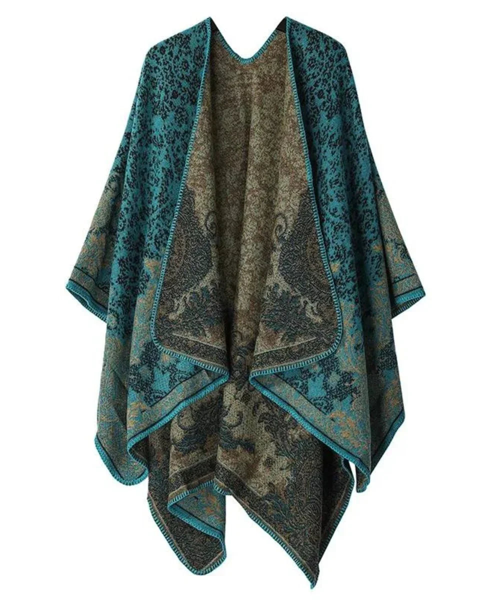 Poncho femme bleu à motifs élégants, coupe ample, tendance hiver ou automne.
