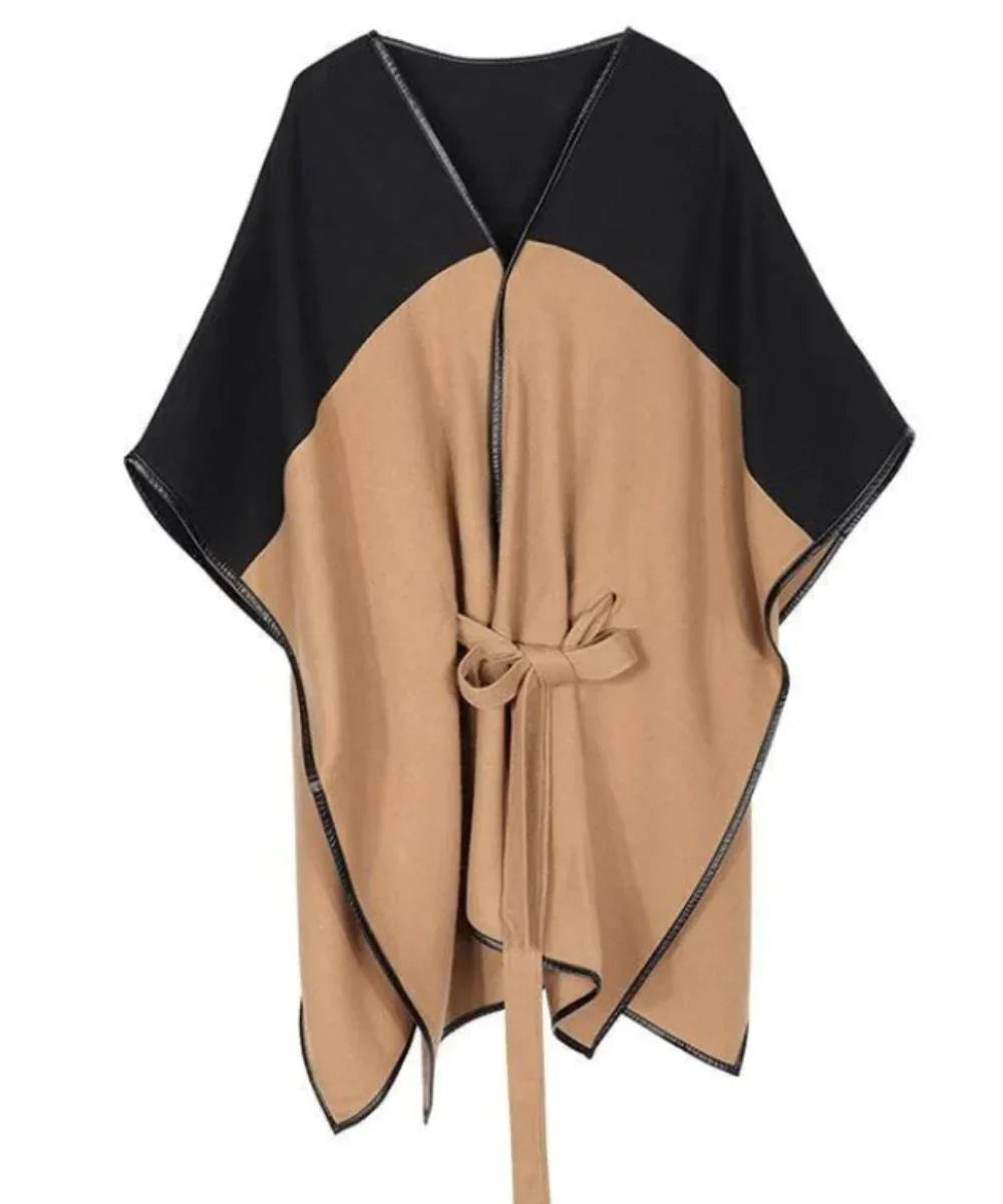 Poncho femme bicolore beige et noir avec ceinture nouée à la taille, col en V.