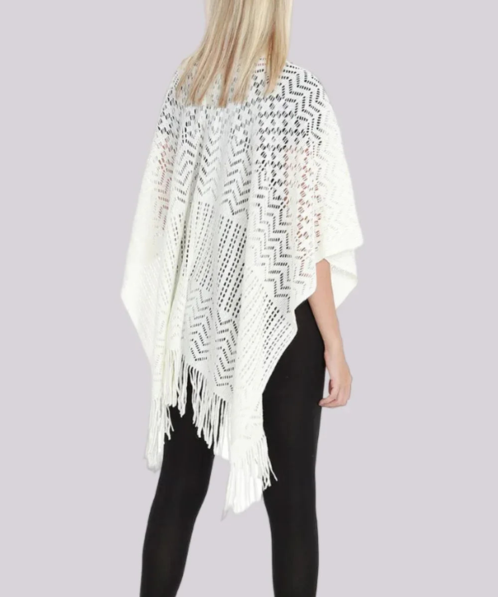 Poncho femme dentelle blanc avec franges, motif géométrique, vu de dos