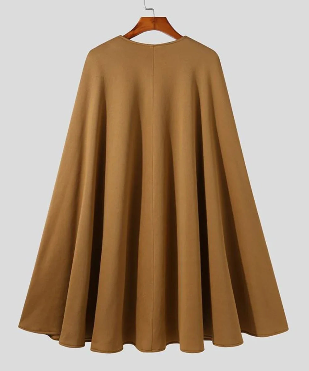 Poncho homme beige uni, coupe ample, tissu fluide, vu de dos sur cintre