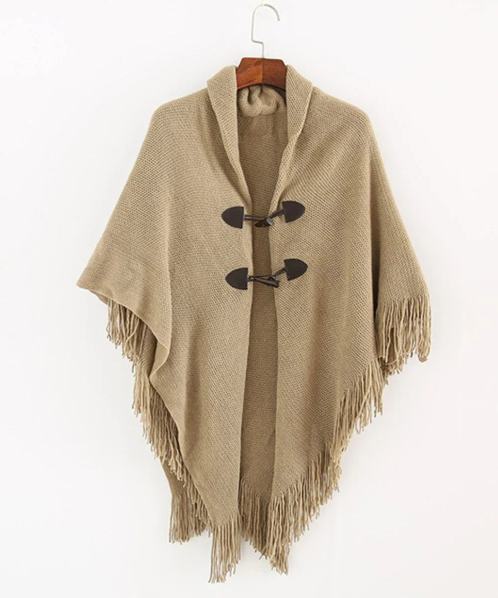 Poncho court femme beige avec franges et fermetures, style élégant et décontracté