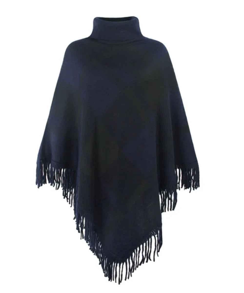 Poncho femme bleu marine à col roulé et franges, style élégant et hiver.