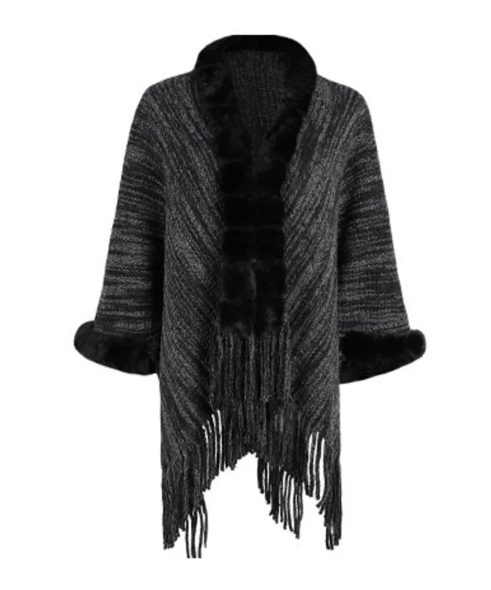 Poncho femme à manches longues noir avec col en fausse fourrure et franges élégantes