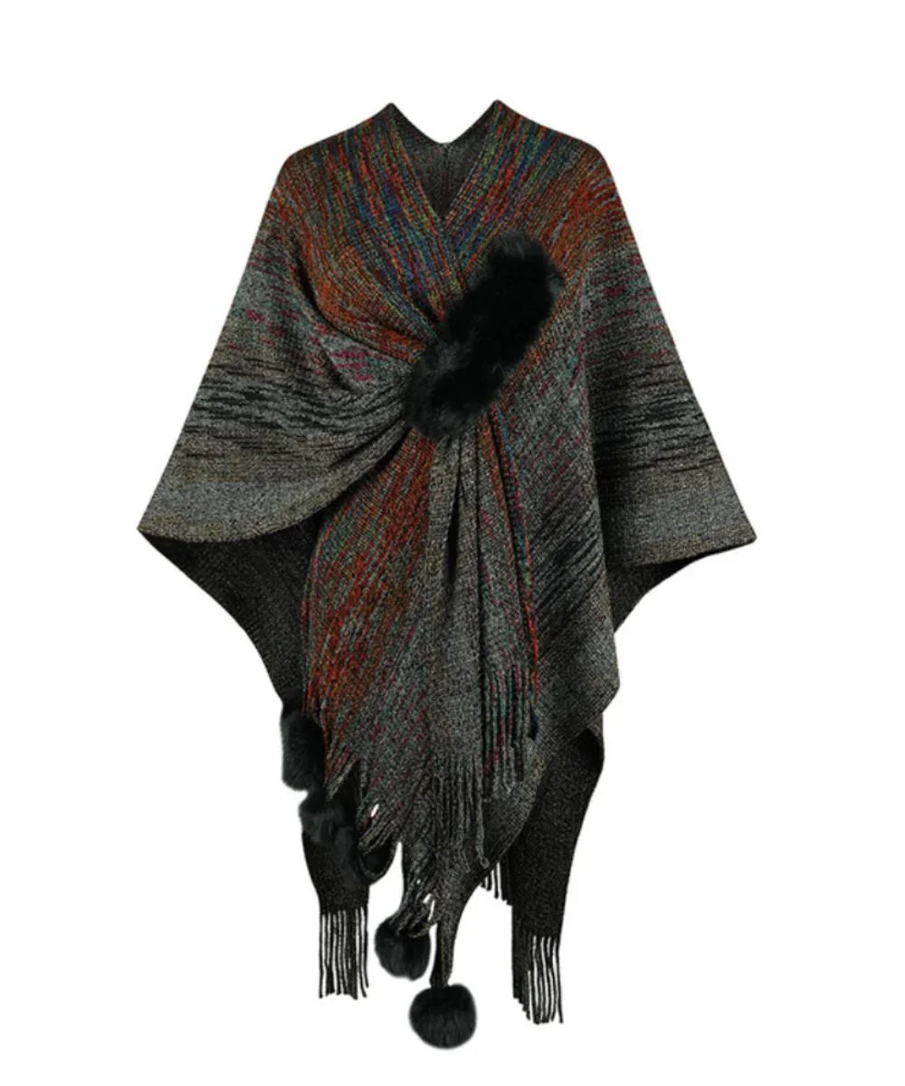 Poncho long noir à motifs tissés, détails franges et pompons, accessoire d'hiver élégant
